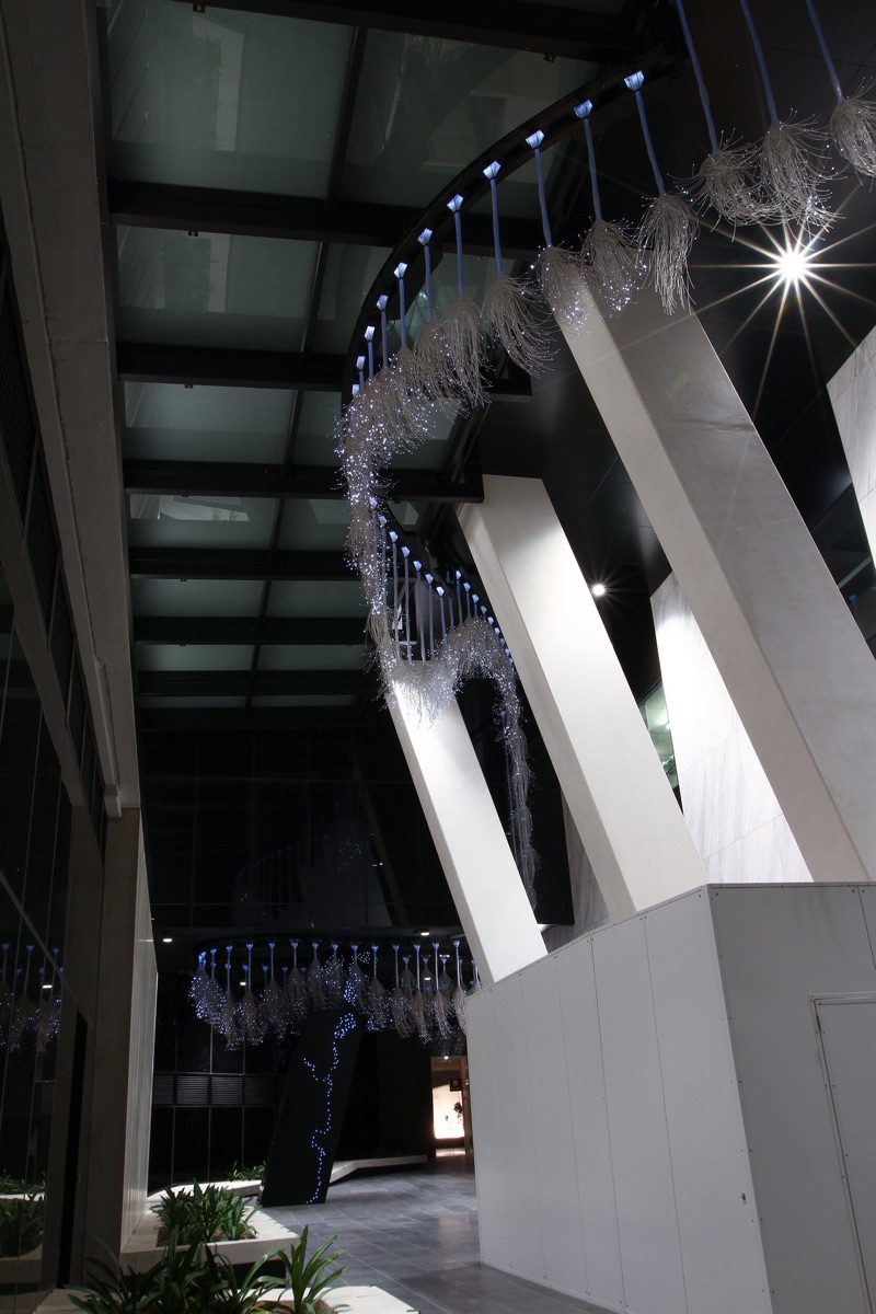 Murmur lit at night in the Marina Tower atrium