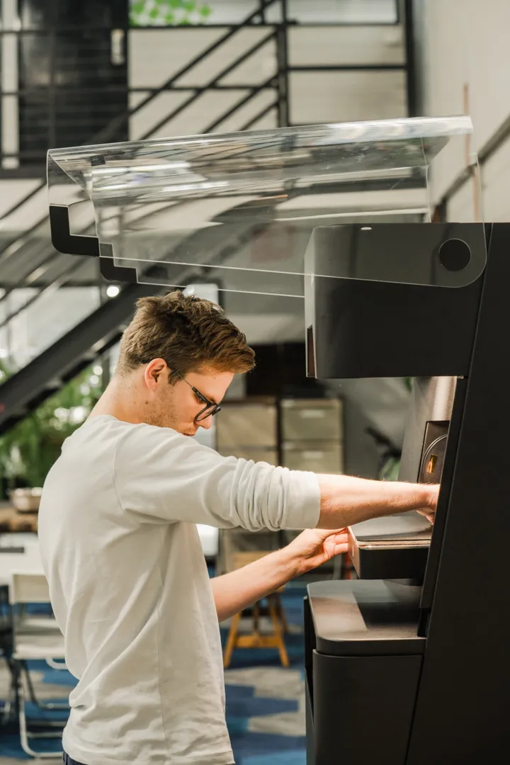 Engineer operating equipment in the workshop