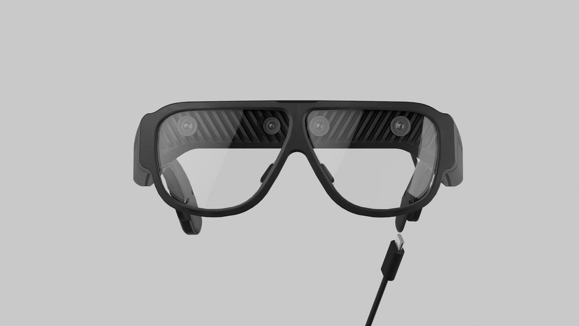 Front view of the Bionic Vision glasses, with four camera and sensor apertures set into the louvred brow bar above the lenses