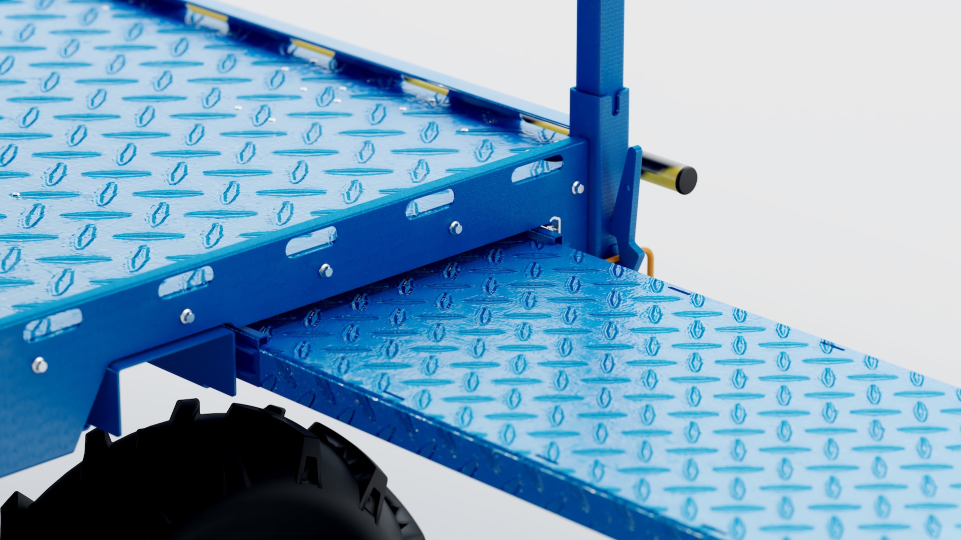 Close-up of the FieldBot's blue chequer-plate deck and fold-out side platform, a black treaded tyre beneath