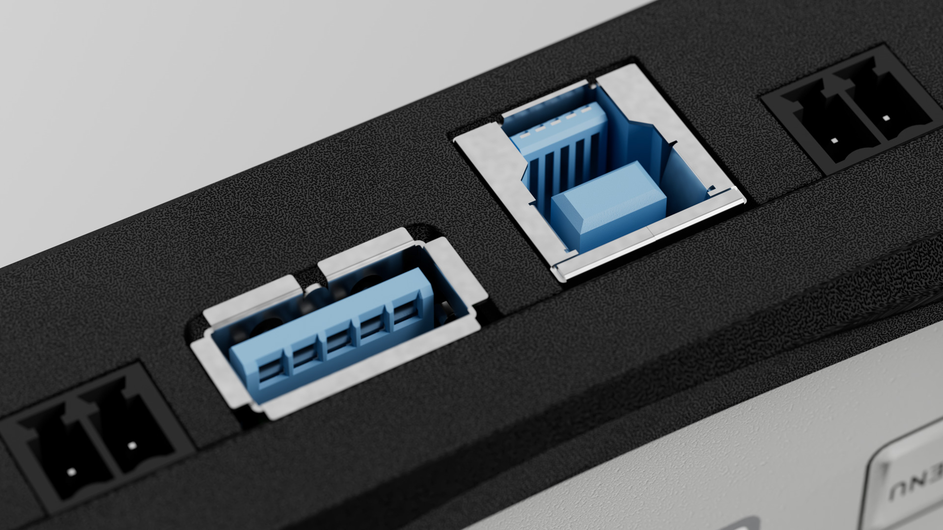 Close-up of the Log4.USB meter's connector edge, blue USB in and out ports set between two-pin screw terminals