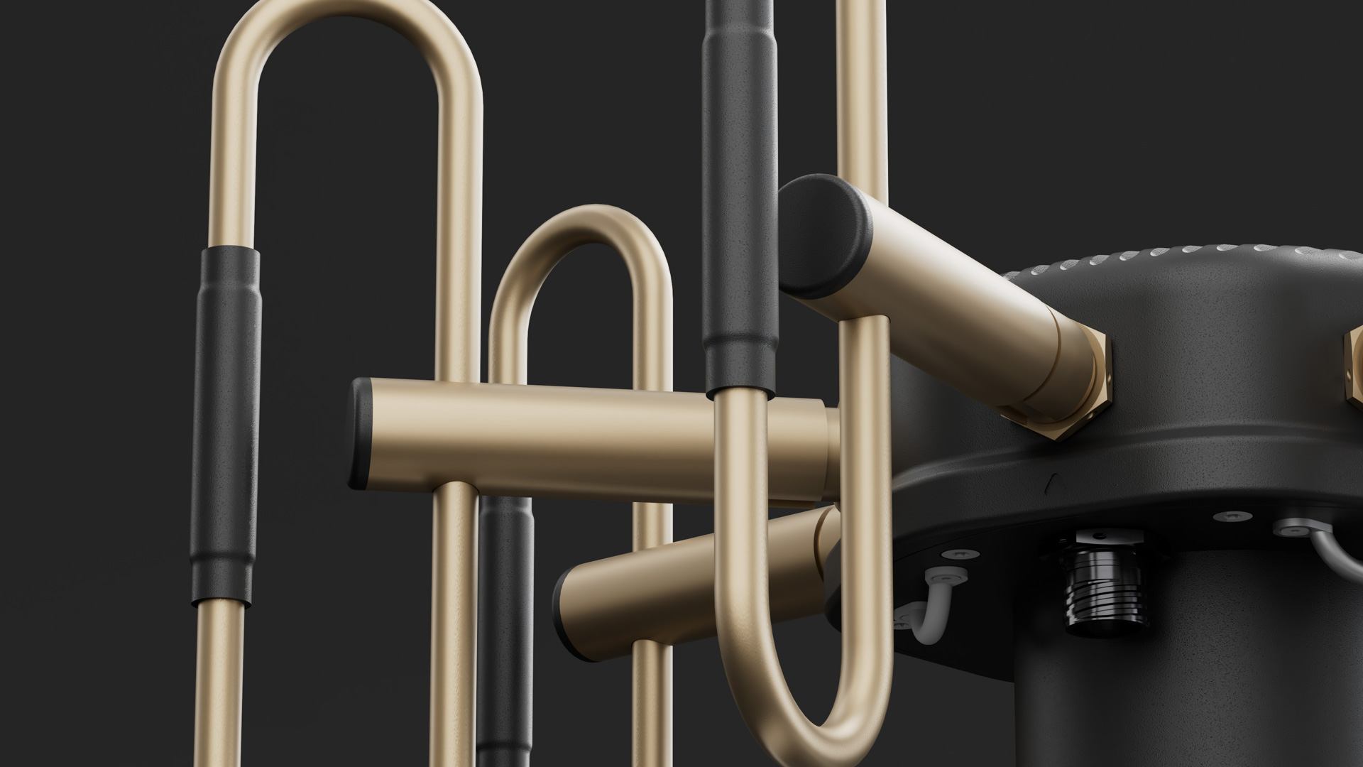 Close detail of the masthead: brass antenna elements in insulating sleeves bolting into the sealed hub, beside a cable gland
