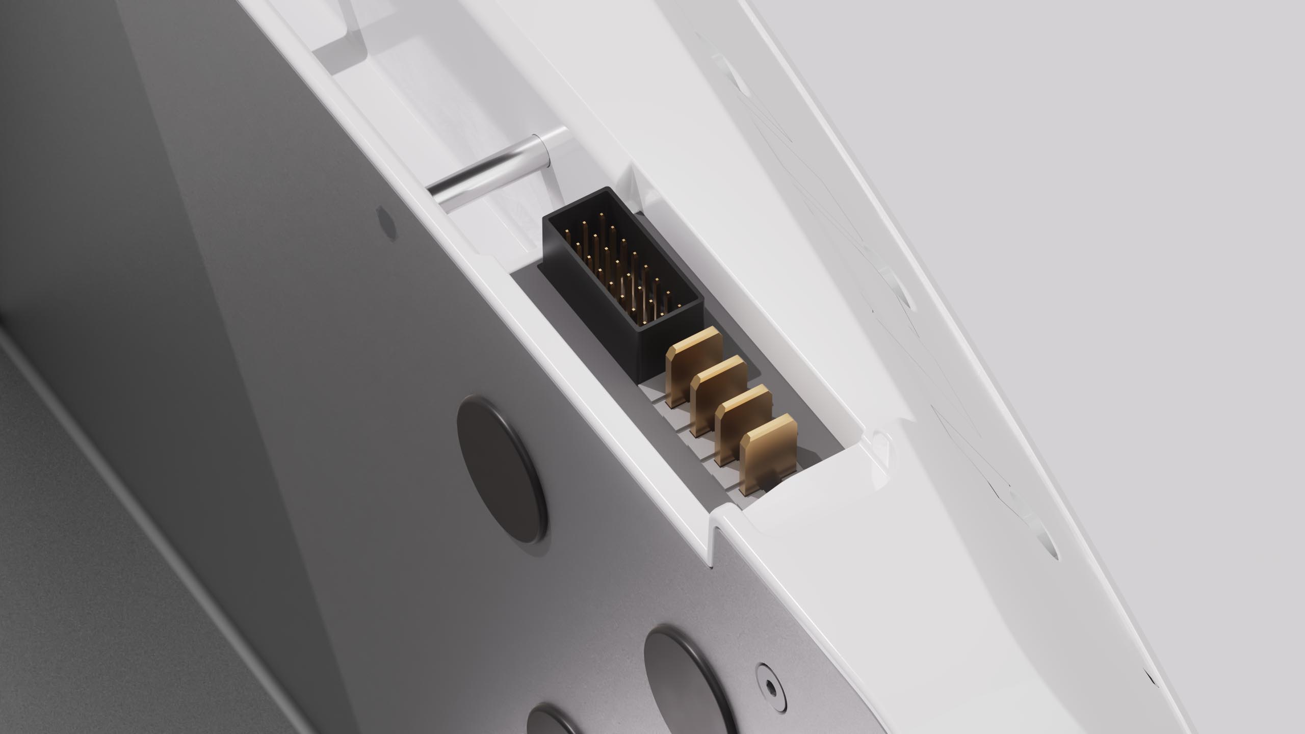 Gold blade contacts and a multi-pin data connector recessed into the charger's white battery interface