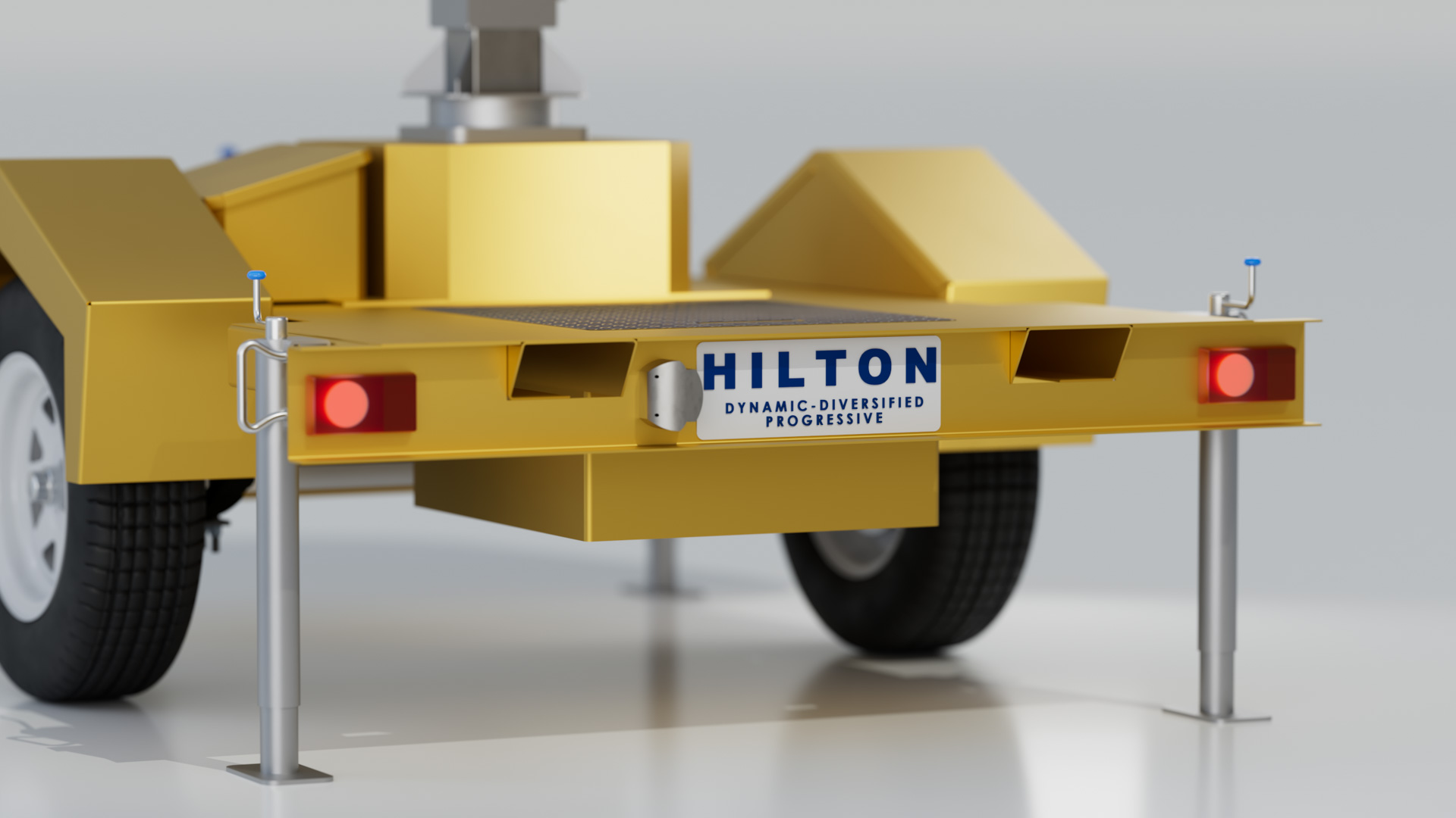 Rear of the yellow sign trailer with a Hilton badge, red tail lights and silver stabiliser legs lowered to the ground